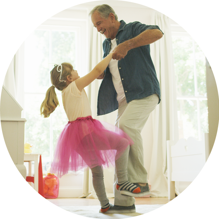 Father and daughter dancing together