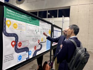 Dr. Roy Marcus presents a clinical research poster